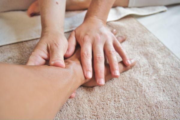 A hand being massaged my Laura at Back To Nature Therapies Bicester
